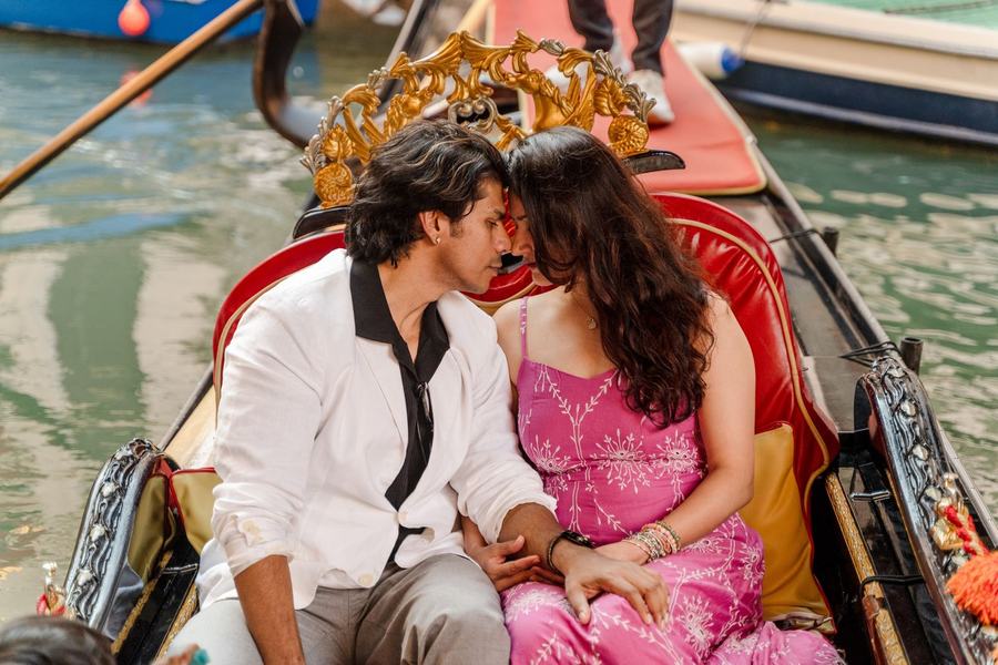 A couple touching foreheads on a gondola